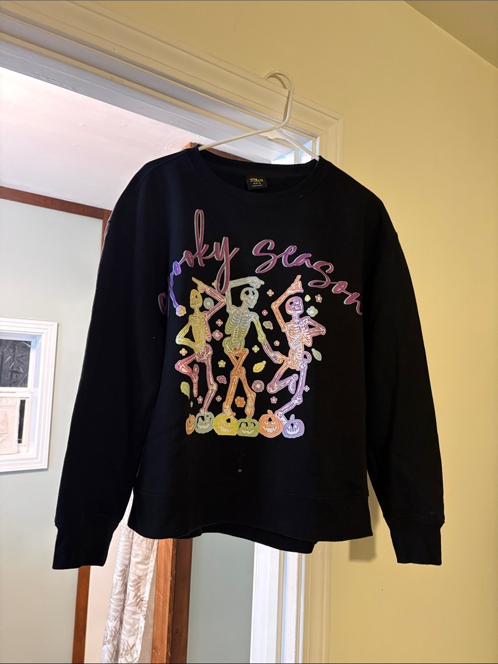 “Spooky Season” Black Sweatshirt with Pastel Skeleton Graphic